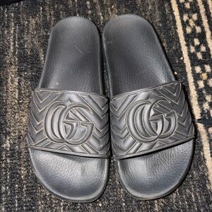 Black Gucci Embossed Slides